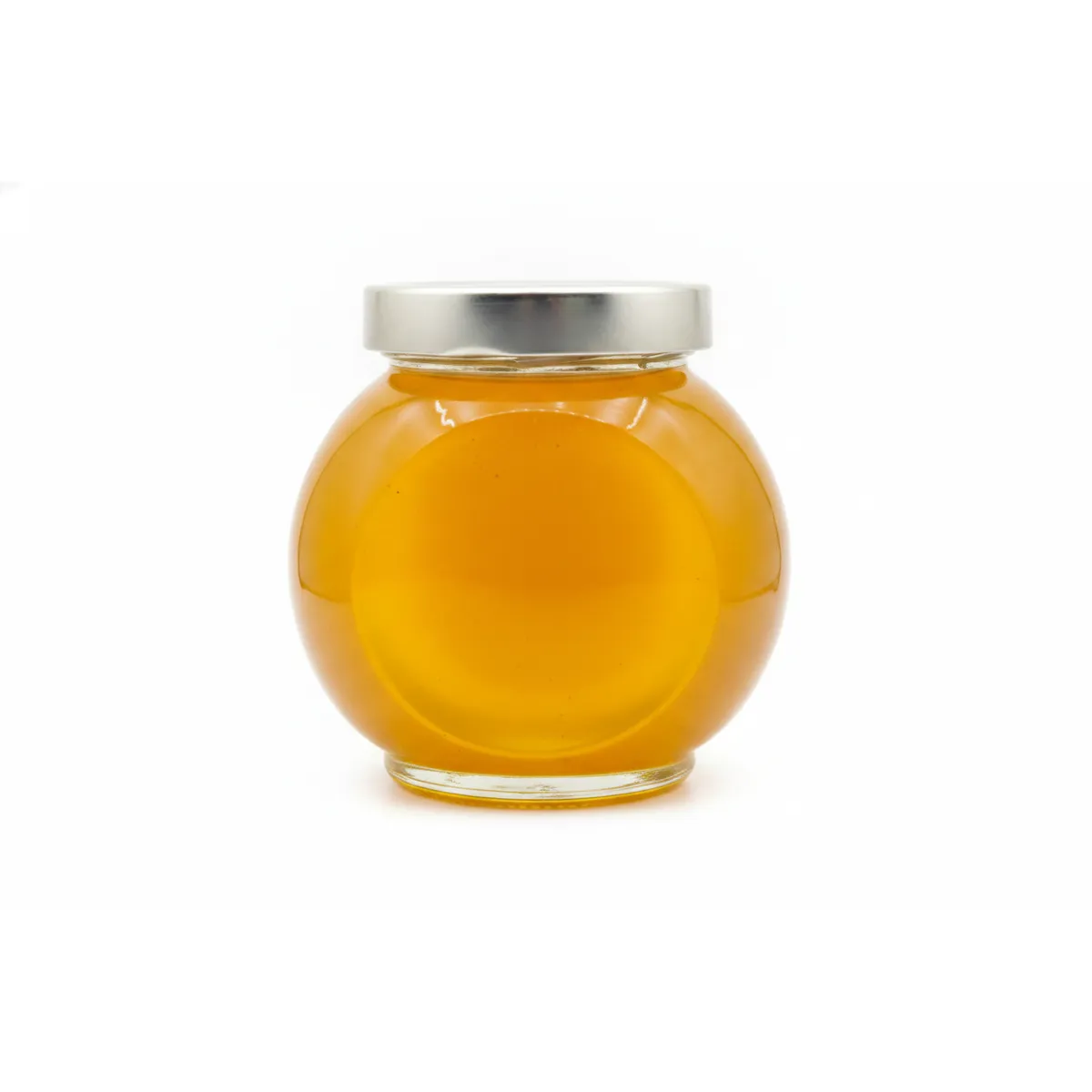 A clear glass jar of golden-brown Yemeni Sidr Marbai 1 honey, with a label, on a simple background.